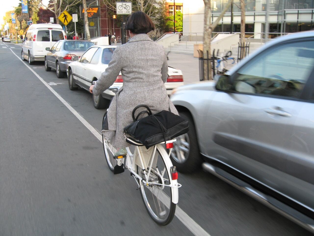 Striped parking lanes and pedestrians signs help create multimodal streets in San José, CA. Source: Richard Masoner / Cyclelicious, Flickr